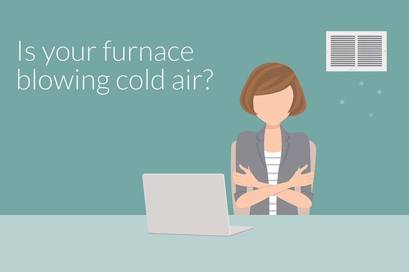 Cartoon lady with brown hair, a purple sweater, and a laptop at her desk shivering because her furnace is blowing cold hair. Video - Why Is My Furnace Blowing Cold Air?